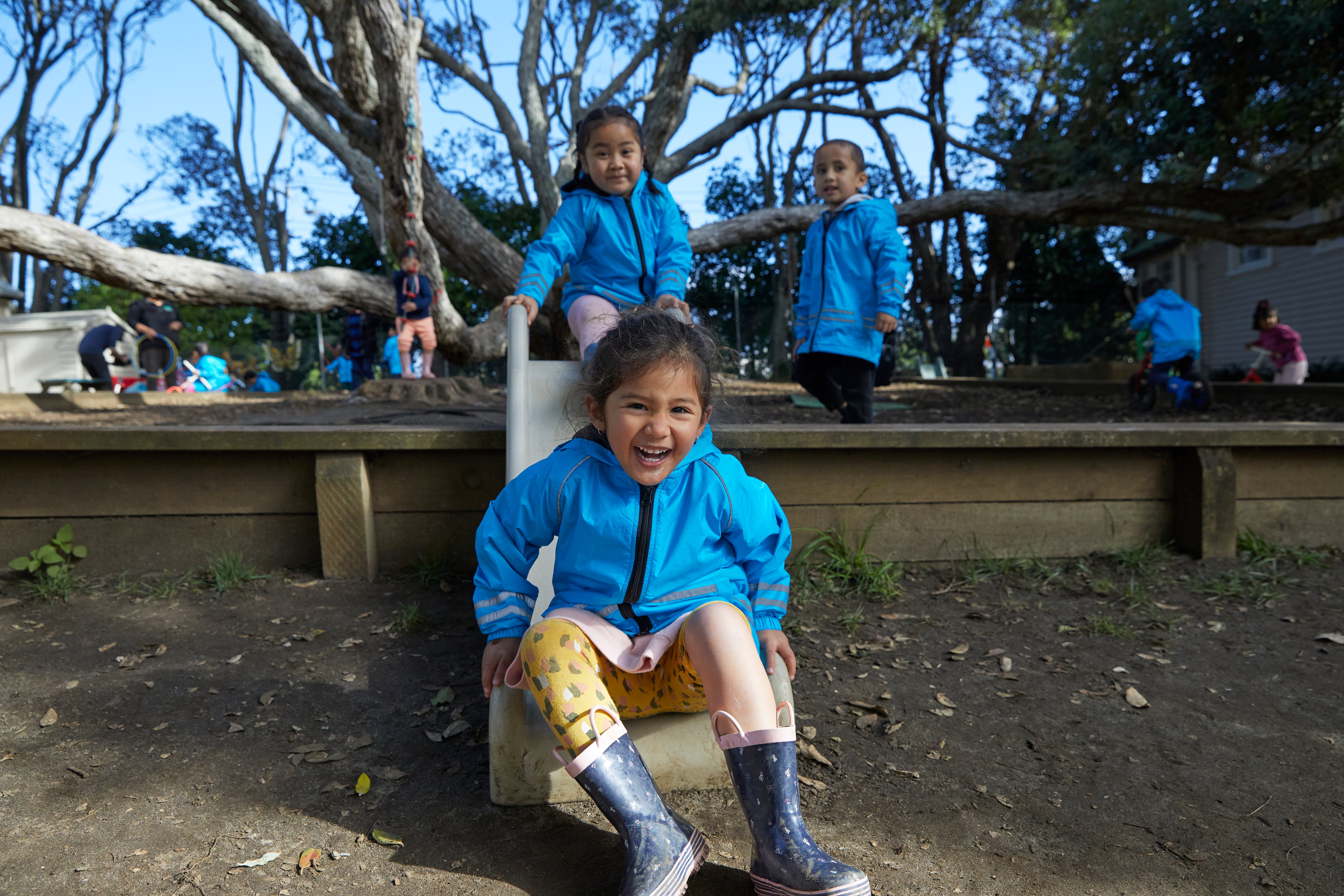 ECE kids playing on slide (1)-1